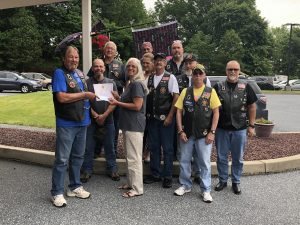 Kim Coy of Ta Ta Rebels presents Gold Certificate to Linglestown American Legion